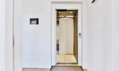 Home Stairlift vs Elevator vs Vertical Platform Lift: Pros, Cons, & Costs